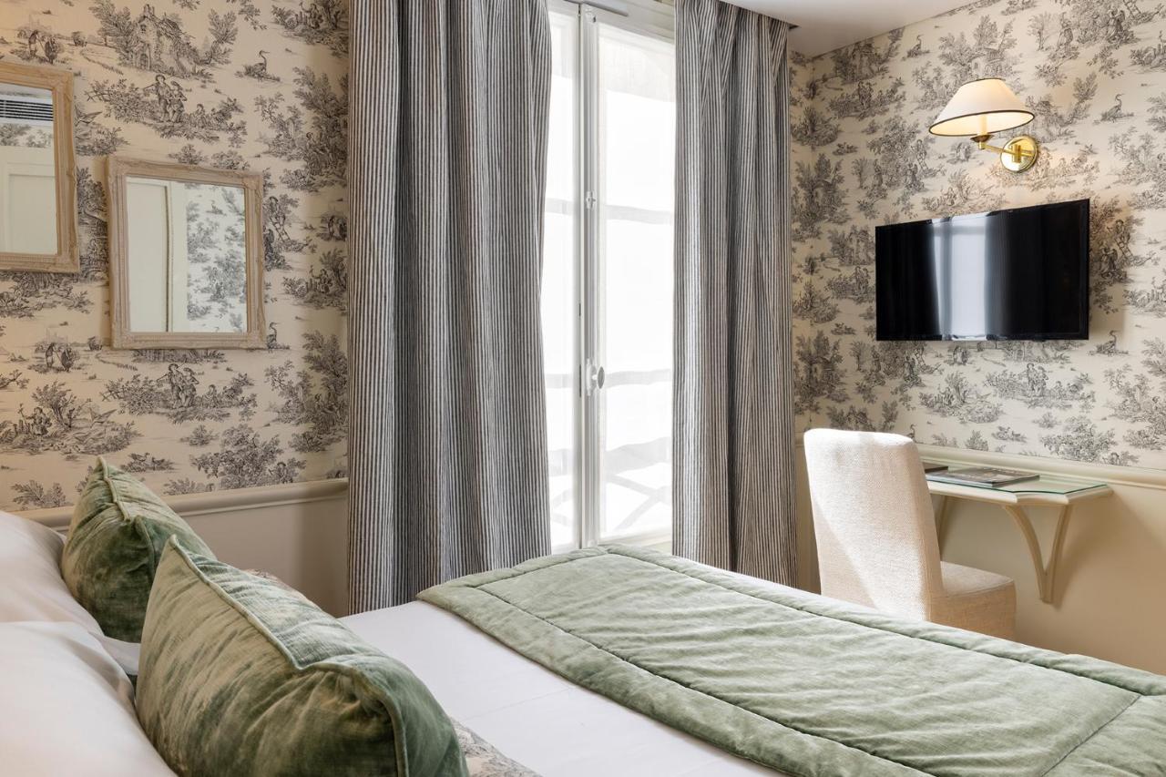 Hotel Du Champ De Mars Paris Bagian luar foto